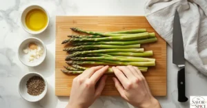 Close-up of an oven preheating to 375°F, showing the temperature dial glowing and the appliance ready for cooking. This step is essential for achieving perfectly cooked and crispy asparagus, whether using the air fryer as an alternative or the oven method.